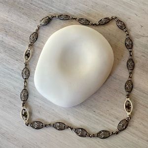 Antique Oval Silver Detailed Necklace With Open Box Closure.